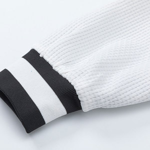 Veste universitaire réversible pour homme en 100 % laine, coloris noir et blanc, coupe droite, col montant, boutonnée sur le devant, style streetwear décontracté - Product Image 6