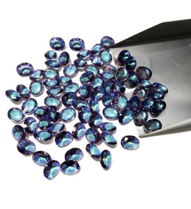 Topacio Místico Ovalado Facetado Creado en Laboratorio al por Mayor |   Piedra Suelta con Recubrimiento Arcoíris |   8x10 mm |   Uso en la Creación de Joyas - Product Image 3