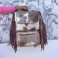 Nouveauté 2026 : Sac à dos en cuir de vachette à franges, sac à dos élégant en cuir de vache à poils, sacs d'école unisexes, sac de créateur unique