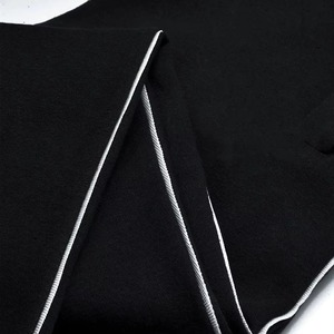 Pantalon de survêtement noir pour homme avec bande latérale blanche, taille élastique, décontracté, respirant, en toile imperméable et écologique, idéal pour l'hiver - Product Image 6
