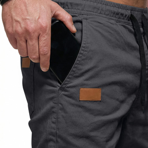 Pantalones deportivos tipo jogger para hombre, color carbón, con cordón ajustable, estilo harem, resistentes al viento, con dobladillo elástico. - Product Image 3
