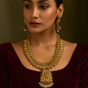 24K Gold Plated Temple Lakshmi Semi Bridal Necklace and Earring Set for Daily Wear - Product Image 1