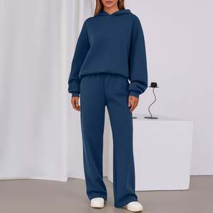 Vente d'usine : Ensemble de survêtement 2 pièces pour femme, comprenant un sweat à capuche oversize et un pantalon large, idéal pour la détente et le sport. - Product Image 2