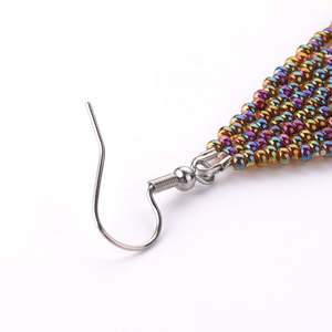 Pendientes Largos Boho con Borlas de Flores Pequeñas y Cuentas de Semillas, Hechos a Mano en México, Marca Lancui - Product Image 5