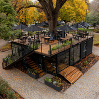 Restaurant en conteneur noir à deux étages EC-20TP avec terrasse en bois pour projets commerciaux