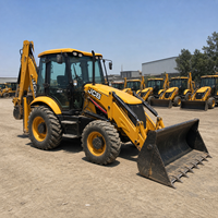Chargeuse-pelleteuse JCB 4CX d'occasion avec moteur fiable