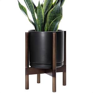 Maceta Moderna de Metal Estilo Bohemio con Patrón de Hojas Talladas a Mano y Patas de Madera para Plantas de Interior - Product Image 4
