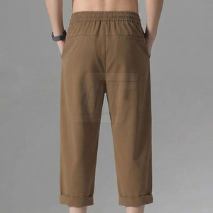 Pantalon homme style designer orné de strass, coupe slim, décontracté, avec motif de pierres décoratives, finition élégante et contemporaine - Product Image 2