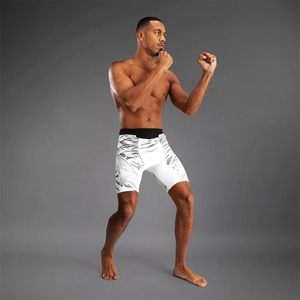 Shorts de compression pour homme à imprimé géométrique, taille mi-haute, séchage rapide, style sportif, en spandex et polyester tricoté - Product Image 6