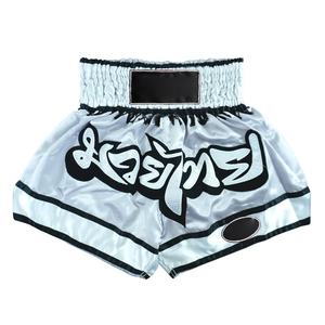 กางเกงมวยไทย MMA สำหรับต่อสู้ แบบสวมใส่สบาย ระบายอากาศได้ดี น้ำหนักเบา ปรับแต่งได้ ทรงหลวม ผลิตจากโพลีเอสเตอร์ 100% สำหรับทุกเพศ - Product Image 1