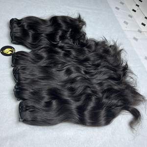 Precio de fábrica al por mayor barato 100% cabello humano virgen natural ondulado paquetes de extensiones de cabello de Vietnam - Product Image 1