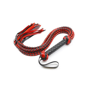 Látigo de cuero con mango trenzado y extremo con borla - Product Image 1