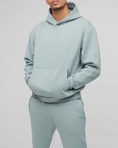 Conjunto de dos piezas de sudadera con capucha y pantalones deportivos para hombre, 100% algodón, diseño sólido con paneles, estilo moderno. - Product Image 6