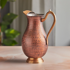 Ornate floral carved <b>copper</b> water pitcher with brass <b>handles</b>, available at wholesale prices and made in India. - Product Image 5