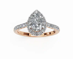 Anillo de diamantes Pear Halo con un peso total de 0840 quilates y 29 diamantes brillantes para un aspecto radiante y sofisticado - Product Image 1