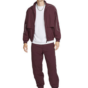 Ensemble de survêtement coupe-vent personnalisé en nylon pour femme : veste de sport zippée et pantalon coupe-vent pour l'entraînement - Product Image 1