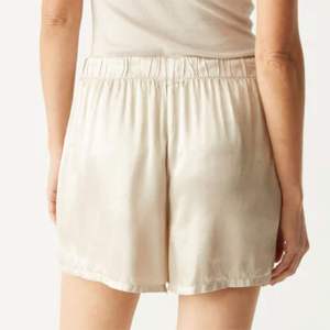 Women's Loose Fit Cotton Oxford Shorts Solid Color <b>Elastic</b> Waist Casual Mid Rise Breathable Woven Fabric Short <b>Skirts</b> - Product Image 2