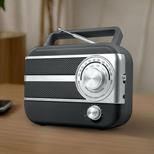 Meilleur prix Radio portable analogique Design rétro Réception bi-bande Alimenté en CA/CC Haut-parleur intégré en plastique durable Portant la radio - Product Image 2