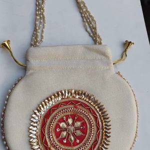 Sac Potli Crème Élégant avec Broderie Traditionnelle Gota Patti et Accents de Perles, Sac Potli Fait Main en Tissu Crème Riche - Product Image 1