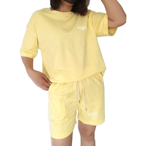 Conjunto de chándal de verano de dos piezas para mujer, de lona sólida, transpirable, de ajuste holgado, con cuello redondo y manga corta. - Product Image 2