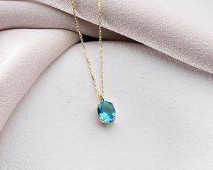Colgante de Topacio Azul Ovalado, Piedra de Nacimiento de Diciembre, Plata de Ley 925, Chapado en Oro de 14K, Chapado en Rodio, Joyería Elegante y Minimalista - Product Image 1