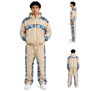 Conjunto Deportivo para Hombre, Chaqueta con Capucha Beige y Pantalones a Juego con Estampado Azul Mármol, Estilo Casual y Urbano - Product Image 1