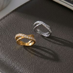 Wholesale <b>Gold</b> Plated Stainless Steel Crossover Zircon <b>Ring</b> for Unisex Women - Product Image 3