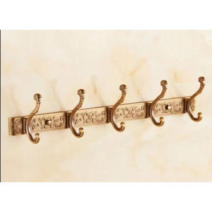 Ganchos y colgadores de lujo para el hogar y hoteles, hechos de metal de calidad superior, con diseño elegante y único, chapados en oro de alta calidad, al precio más bajo. - Product Image 1
