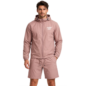 Conjunto de dos piezas para hombre: Chaqueta cortavientos de poliéster personalizada y pantalones cortos, atuendo ligero de estilo urbano con bordado de marca y cordones. - Product Image 1
