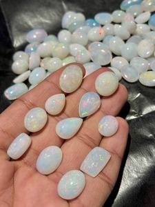 โอปอลไฟธรรมชาติทรงรีแบบหลวม ขัดเงา สีโอปอล  ผ่านการประเมินโดยบุคคลที่สาม 5000 กะรัต  เหมาะสำหรับทำเครื่องประดับ - Product Image 6