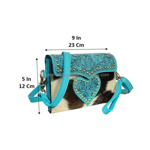 กระเป๋าสะพายข้างหนังวัวแท้ลายหัวใจสไตล์ตะวันตกสีเทอร์ควอยซ์ งานแฮนด์เมด ขายดี พร้อมสายสะพายไหล่ปรับได้ - Product Image 2