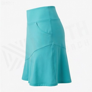 Jupe courte asymétrique taille haute pour femme avec poches, couleur unie, style sportif, tissu respirant en spandex et polyester - Product Image 3