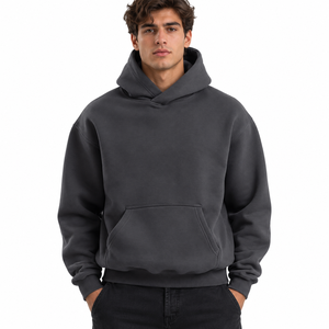 Sweat à capuche ample et décontracté pour homme avec cordon de serrage croisé, capuche amovible, manches larges, poche frontale et bordure côtelée - Product Image 1