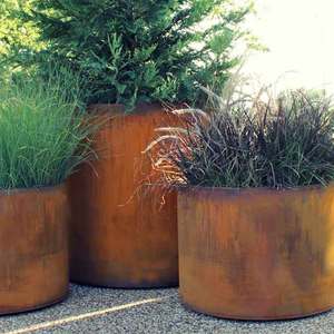High Quality Design Round Rust Finish Metal Outdoor Planter Modern Industrial Style Freestanding Garden Container Planters - Product Image 1