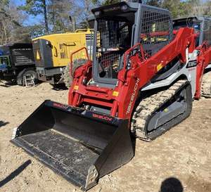 Chargeuse compacte sur chenilles Takeuchi TL10V2 d'occasion avec moteur diesel, pompe hydraulique et godet pour la construction - Product Image 1