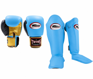 Ensemble de gants et protège-tibias de Muay Thai en cuir bleu avec fermeture auto-agrippante pour adultes, idéal pour l'entraînement et le sparring en arts martiaux - Product Image 1