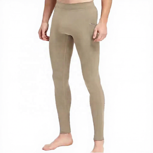 Leggings de compression intégrale pour hommes, couleur unie, taille élastique, logo thermocollé sur la jambe droite, en Spandex et Nylon - Product Image 1