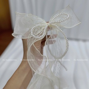 เครื่องประดับผม โบว์ผ้าออร์แกนซ่าขนาด 18*27 ซม. สำหรับผู้หญิง ประดับด้วยลูกไม้และสายไข่มุก จากเวียดนาม เหมาะสำหรับงานปาร์ตี้ - Product Image 3