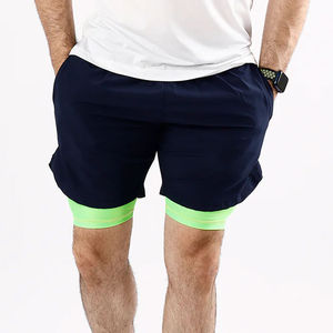 Pantalones Cortos Deportivos Negros de Secado Rápido para Hombre, Cintura Media, Cierre Elástico, Material Spandex, Bolsillos, Ribete Verde, Estilo Casual Urbano - Product Image 6