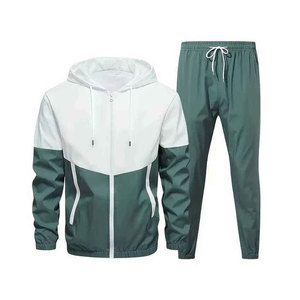 Survêtements personnalisés avec logo en caoutchouc pour hommes, ensemble coupe-vent 100% coton avec doublure en mesh et pantalon de jogging zippé - Product Image 1