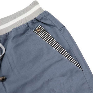 Shorts d'été pour hommes de haute qualité, en coton uni, respirants, à séchage rapide, avec taille élastique, fermeture à boutons, fabriqués au Pakistan - Product Image 5