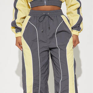 ชุดวอร์มครอปสีสันตัดกันสำหรับผู้หญิง สไตล์สปอร์ตสตรีทแวร์ เสื้อแจ็คเก็ตน้ำหนักเบาพร้อมเชือกผูกเอว ขายส่งแบบ OEM - Product Image 3