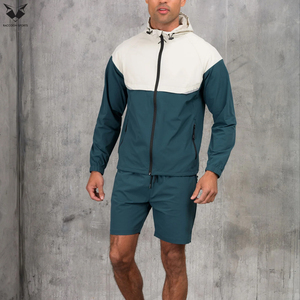 Conjunto de Pantalones Cortos y Chaqueta Deportiva para Hombre, Color Verde Azulado Oscuro, Estilo Moderno con Bloques de Color, Chaqueta con Capucha, Cintura Elástica, Ropa Deportiva Informal - Product Image 3