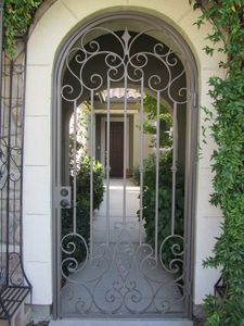 High-End Traditional Wrought <b>Iron</b> Gate with Intricate Scrollwork, Custom Finish, and Strong Construction for Grand Residences - Product Image 1