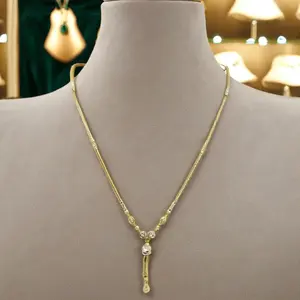 Elegante Collar Dorado de Dos Tonos con Cuentas Texturizadas y Colgante Largo, Diseño Tradicional Delicado para Mujer - Product Image 3