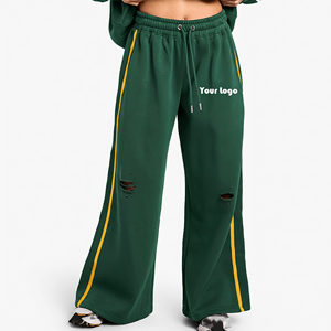 Pantalon de survêtement ample vert foncé pour femme avec bande latérale jaune, taille élastique à cordon de serrage, détail déchiré aux genoux, coupe décontractée - Product Image 4