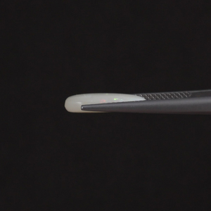 โอปอลสีขาวธรรมชาติแบบขายส่ง น้ำหนัก 2.59 กะรัต รูปทรงวงรี ขนาด 14.5x8 มม. ได้รับการรับรองจาก IGI ขัดเงาด้วยมือ ใช้น้ำมัน/แว็กซ์ คุณภาพดี - Product Image 2