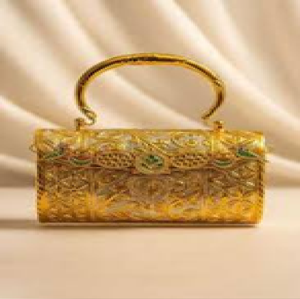 Ornate golden brass hand clutch featuring detailed floral engraving, ghungroo <b>bells</b>, and a metal chain, at wholesale prices. - Product Image 2