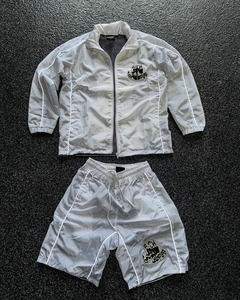 เสื้อโปโลไนลอนโพลีเอสเตอร์แบบมีซิปป้องกันลมพร้อมโลโก้สั่งทำพิเศษ ปี 2026 ชุดเซ็ต 2 ชิ้น กางเกงขาสั้นคาร์โก้ ชุดสูทผู้ชาย เสื้อแจ็คเก็ตกันลม เสื้อยืดแขนสั้น - Product Image 5