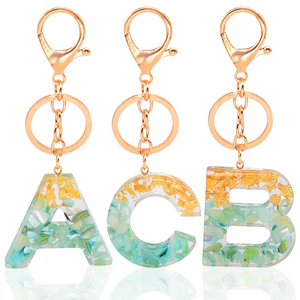 Porte-clés en résine époxy incrustée de feuille d'or, unique, élégant, vif, exquis, idéal pour un cadeau, populaire, faible MOQ, vente en gros - Product Image 4